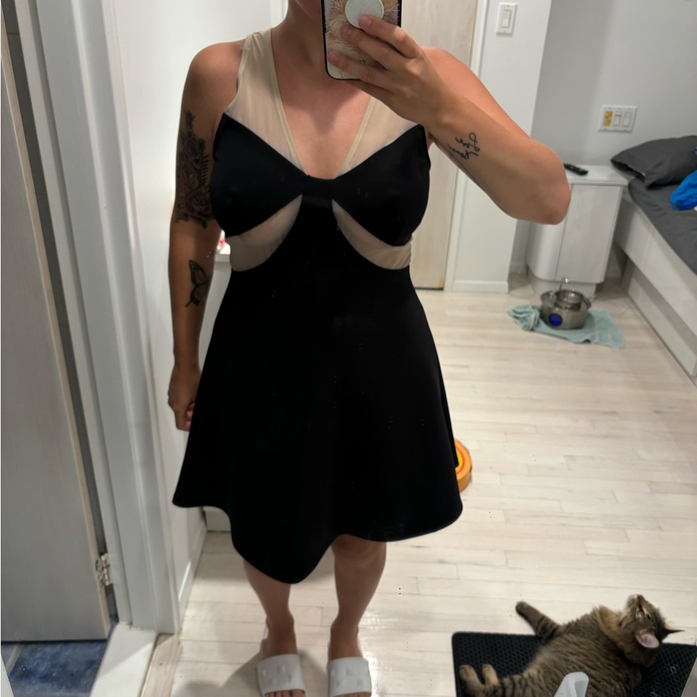 Black and nude above knee dress with sheer back size medium